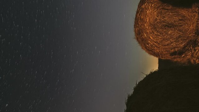 Comet Neowise C 2020 F3 In Night Starry Sky Above Haystacks In Summer Agricultural Field. Night Stars Above Rural Landscape With Hay Bales After Harvest. Agricultural Concept. 4K Timelapse.