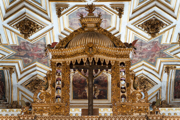 Ornate Golden Altarpiece in Baroque Style Church Interior