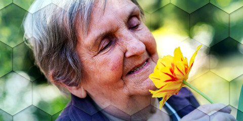 Portrait of an old woman smelling a flowe, geometric pattern