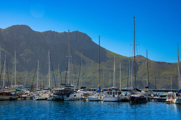 Fototapeta na wymiar Ships in False Bay at Kalk Bay near Cape Town in South Africa