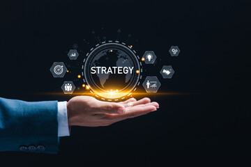 business strategy and Action plan. Businessman holding virtual globe with strategy icons for Strategic planning for business success. business development concept. - Powered by Adobe