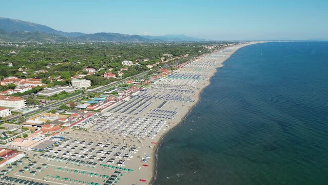 Beach and Coastline of Forte dei Marmi at Summer Vacation in Tuscany, Italy - Aerial 4k