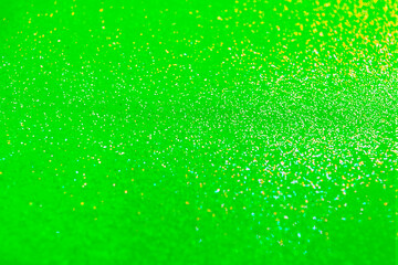 St. Patrick day. Shiny green glitter, closeup. Bokeh effect
