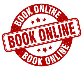 book online stamp. book online label. round grunge sign