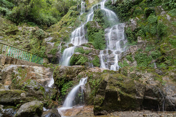 Beautiful cascading Bakthang waterfall in the Himalayan valley in Sikkim, India