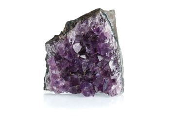 Amethyst mineral stone macro on white background