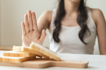 person avoid to eating white bread for her health.
