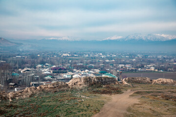 view of a surrounding from the top of the castle mountain in a panoramic view in Tajikistan - obrazy, fototapety, plakaty