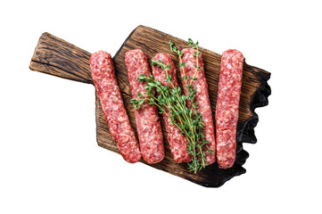 Homamade raw meat lula kebabs sausages on a cutting board.  Transparent background. Isolated.