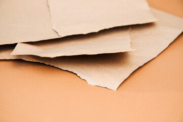 Packaging of eco-materials. Packaging paper on a brown background. Concept saving the planet from...