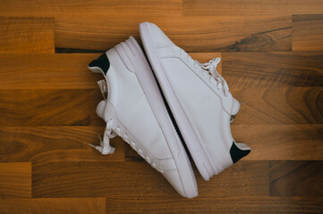 Urban Elegance: White Sneakers on the Floor