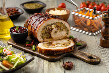 Stuffed turkey breast. Roasted whole, served with fresh vegetables.