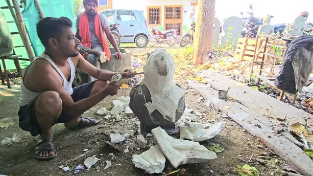 Artist is working and creates fibre half bust human man sculpture using plaster mold. Art and Sculpture.
