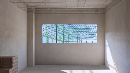 Warehouse building structure inside of panoramic window frame on concrete wall of industrial office...