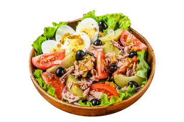 Nicoise salad with tuna,  tomatoes, olives, green beans, cucumber, soft boiled eggs and potato in a wooden bowl.  Transparent background. Isolated.
