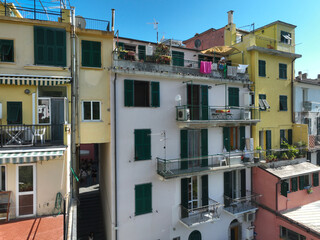 Fototapeta na wymiar Manarola Village Cinque Terre Coast Italy. colorful town in Liguria one of five Cinque Terre. Manarola traditional Italian village in the National park Cinque Terre, with multicolored houses on rock