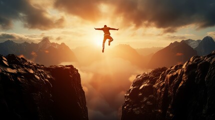 Man jumping over a precipice between two rocky mountains at sunset. Freedom, risk, challenge, success