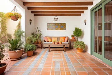 Foto op Canvas classic spanish patio with terracotta floor tiles and greenery © primopiano