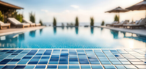 Blue tiled pool edge at outdoor hotel pool