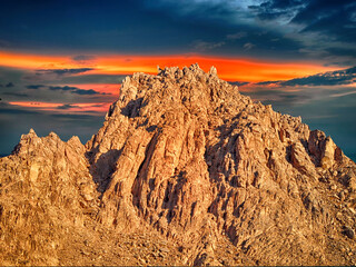 Mountains and sky in the desert at sunset. - 712292205