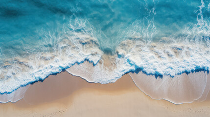 Fototapeta na wymiar Top down view of tropical beach waves engulfing the sand