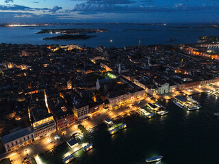 Obraz premium Venice panoramic cityscape landmark at sunset or night, aerial view of Piazza San Marco