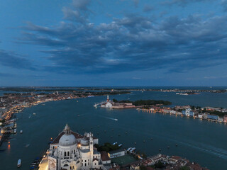 Venice panoramic cityscape landmark at sunset or night, aerial view of Piazza San Marco