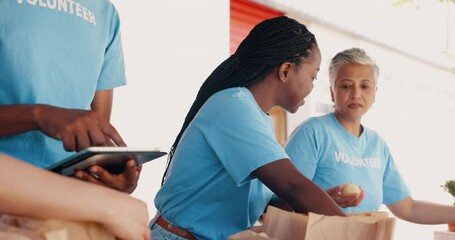 People volunteering, teamwork and food donation in community service, poverty support and NGO checklist. Nonprofit manager, group and tablet for groceries management, distribution and charity project