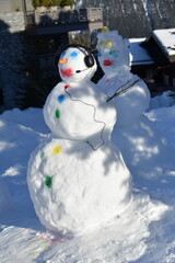 Snowman couple by winter 