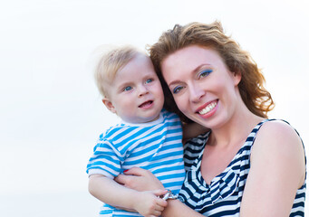 Happy family having fun at the beach