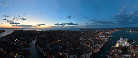 Venice panoramic cityscape landmark at sunset or night, aerial view of Piazza San Marco