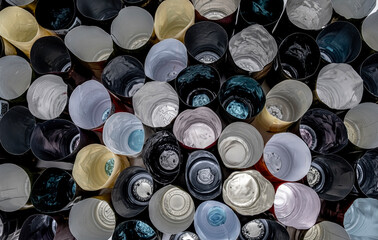 Aluminum and plastic wine bottle caps from different wine producing brands