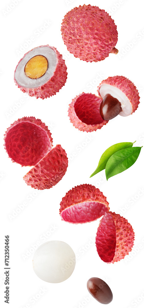 Wall mural isolated flying lychee. falling lychee fruits, whole and cut in half, with leaves isolated on white 