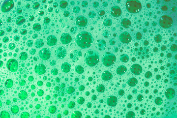 Wzór tekstury zielona tapeta bąbelki bańki z pęcherzykami pianki z bliska