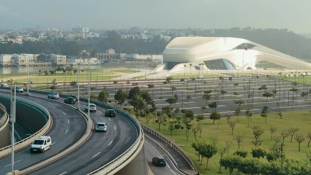 a view of the Grand Theatre of Rabat, located in front of a busy highway with lots of traffic. Morocco