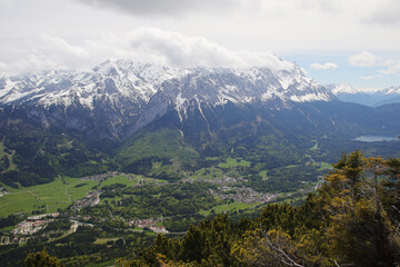Fototapeta na wymiar View from Kramerspitz mountain to Garmisch-Partenkirchen, Upper Bavaria, Germany 