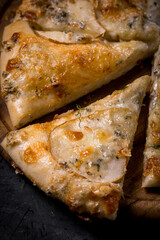 Khachapuri with pear and gorgonzola