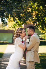 wedding couple walking on the street