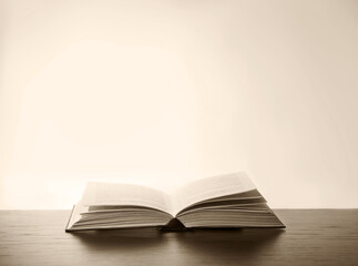 Open book on white background