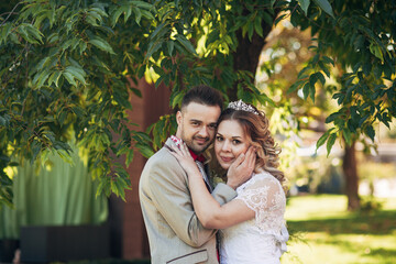 Fototapeta premium wedding couple walking on the street
