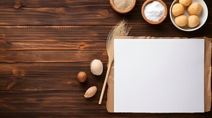 Baking paper on wooden kitchen table for menu or recipes, top view
