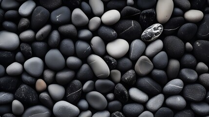 Fototapeta na wymiar Black pebbles on white background