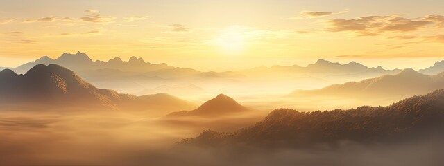 Obraz premium Golden sunrise illuminating the misty mountains. Good atmosphere in the morning. Relax view