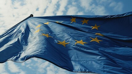 The flag of EU flutters in the wind against a bright blue sky. Created with Generative Ai technology.