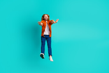 Full size photo of good mood guy dressed blue jeans falling down stretching hands on black friday isolated on turquoise color background