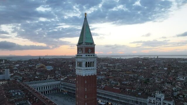 cinematic Aerial Venice cityscape landmark at sunset or night