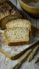 Grain bread on the background of spikelets