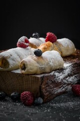Dessert with powdered sugar and berries