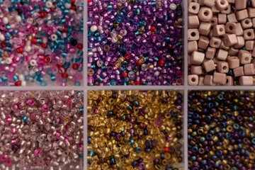 many multi-colored beads of dark shades