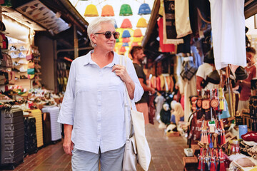 Senior woman shopping at a traditional market in Turkey